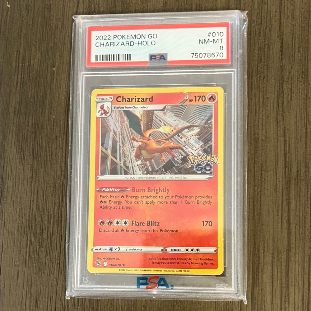 Pokemon Charizard Holo Trading Card - Graded PSA 8